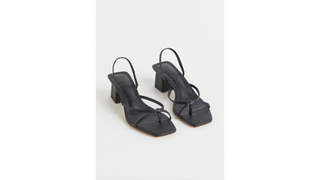 a pair of H&M black sandals