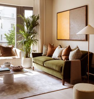 living room ideas beige walls green sofa