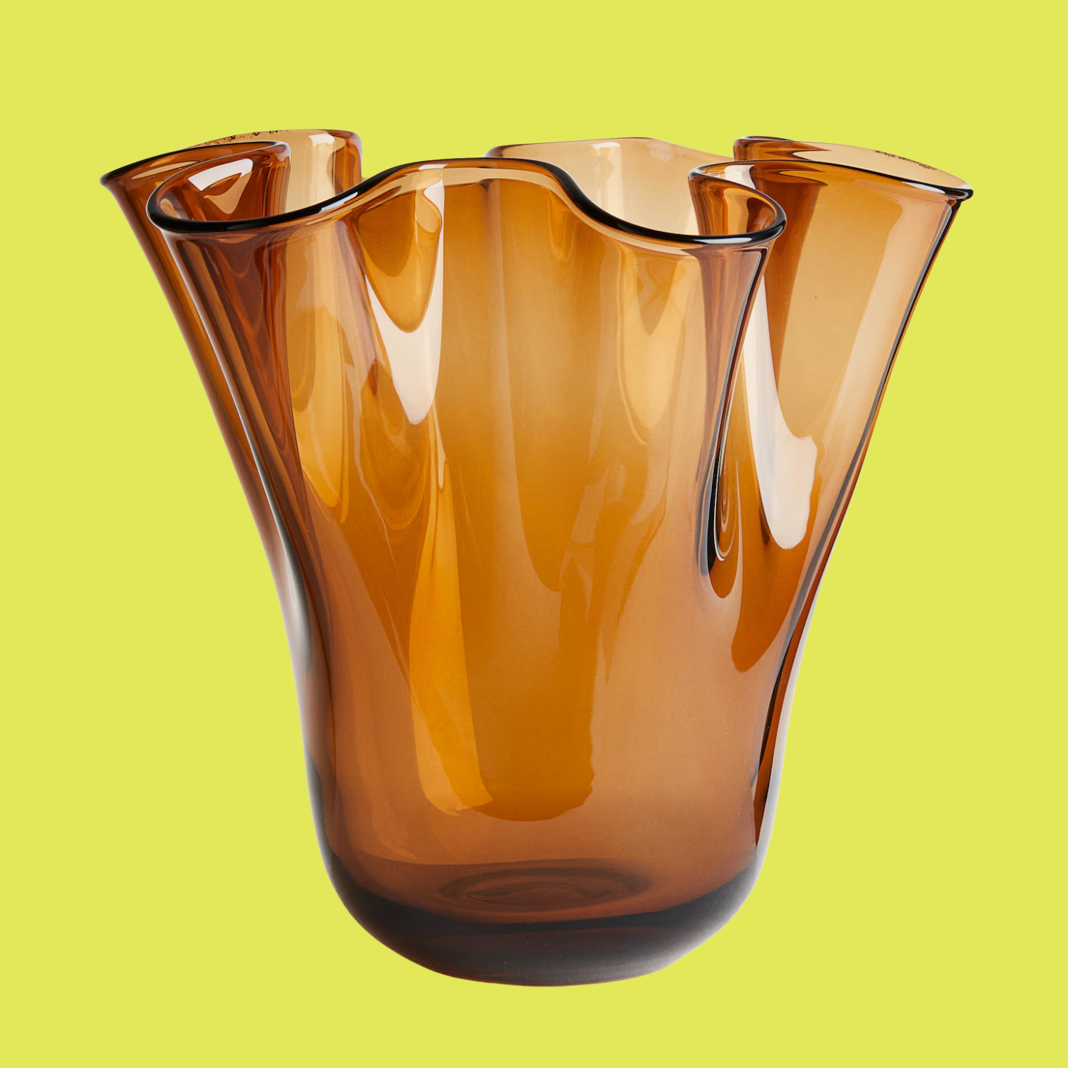 A fluid large glass vase in amber