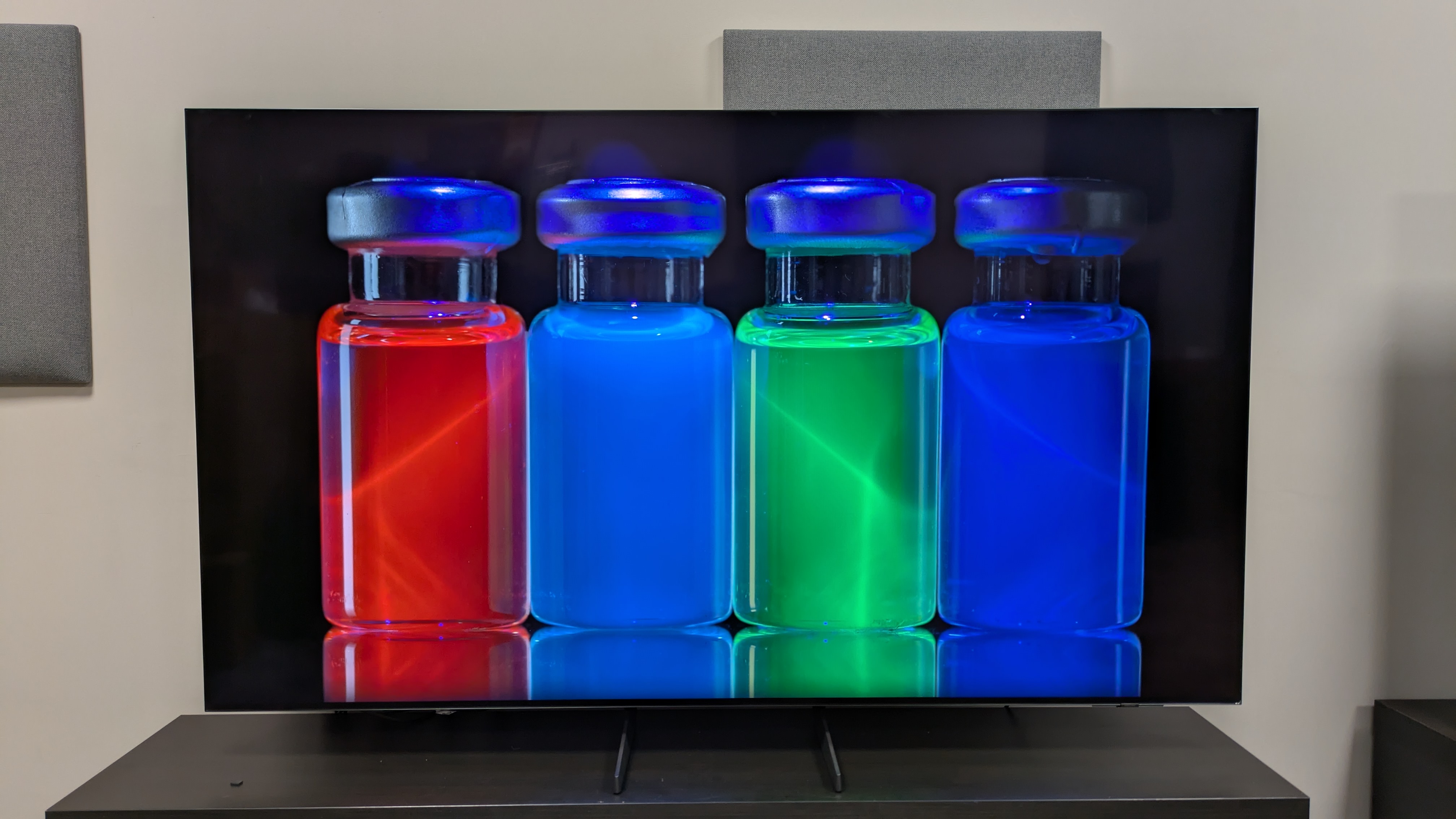 Samsung S85F with multi-colored bottles on screen