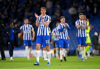 Dan Burn celebrates Brighton's win