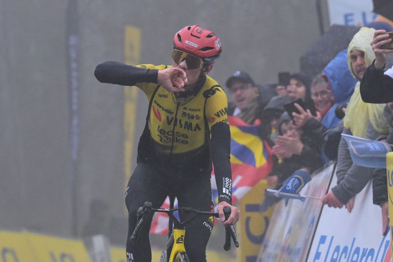 Jonas Vingegaard crossing the line to win stage 4 of Paris-Nice with bib tight straps exposed