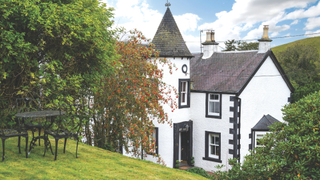 Baronial-style house with a turret