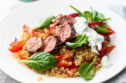 Pan fried lamb with giant couscous salad