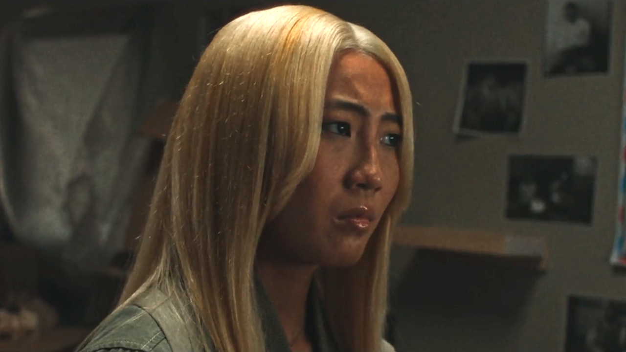Shirley Chen as Joan with blonde hair in Slanted