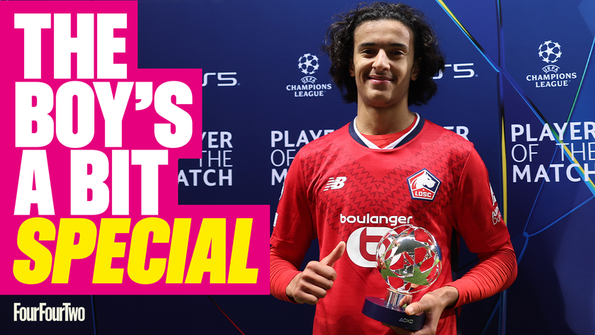 Ayyoub Bouaddi stands proudly with his Champions League Man of the Match prize