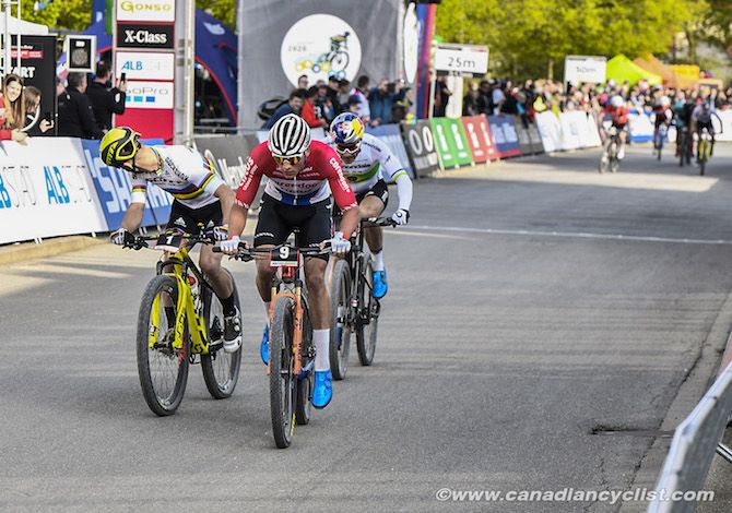 Mathieu van der Poel (Corendon-Circus) leading Nino Schurter (Scott-SRAM MTB Racing) and Henrique Avancini