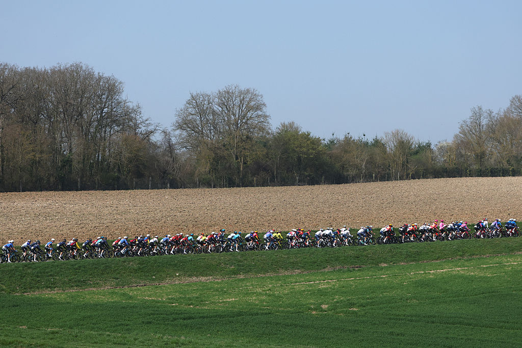 The pack rides during the 1st stage of the Paris-Nice cycling race, 170.9 km between Ach&amp;egrave;res and Carri&amp;egrave;res-sous-Poissy, on March 8, 2026. (Photo by Anne-Christine POUJOULAT / AFP)