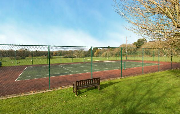 homes with tennis courts for sale