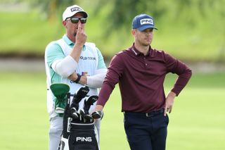 Brandon Stone chats to his caddie