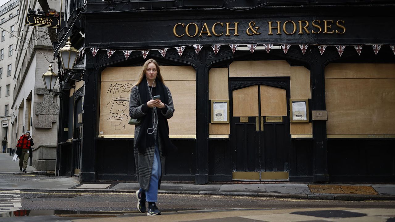 Boarded up pub in London