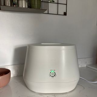 The Lomi Home Composter on the countertop in my kitchen