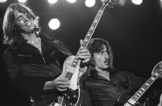 Tom Scholz (left) and Barry Goudreau perform with Boston on stage at Ahoy on October 9, 1979 in Rotterdam, Netherlands