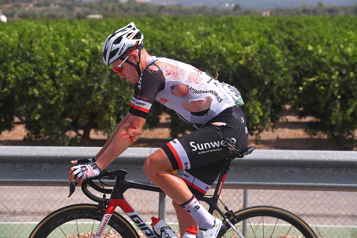 Soren Kragh Andersen (Sunweb) torn up in a crash