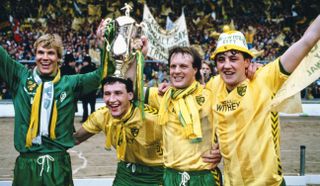 Norwich City players Chris Woods, Dave Watson, Paul Haylock and Steve Bruce celebrate the Canaries' League Cup final win over Sunderland in March 1985.