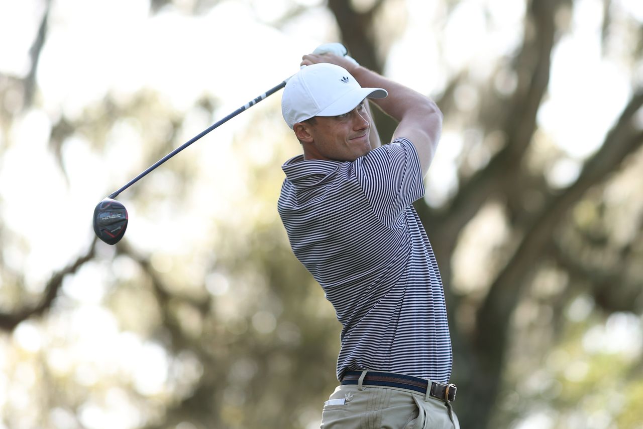 Ludvig Aberg hits a fairway wood