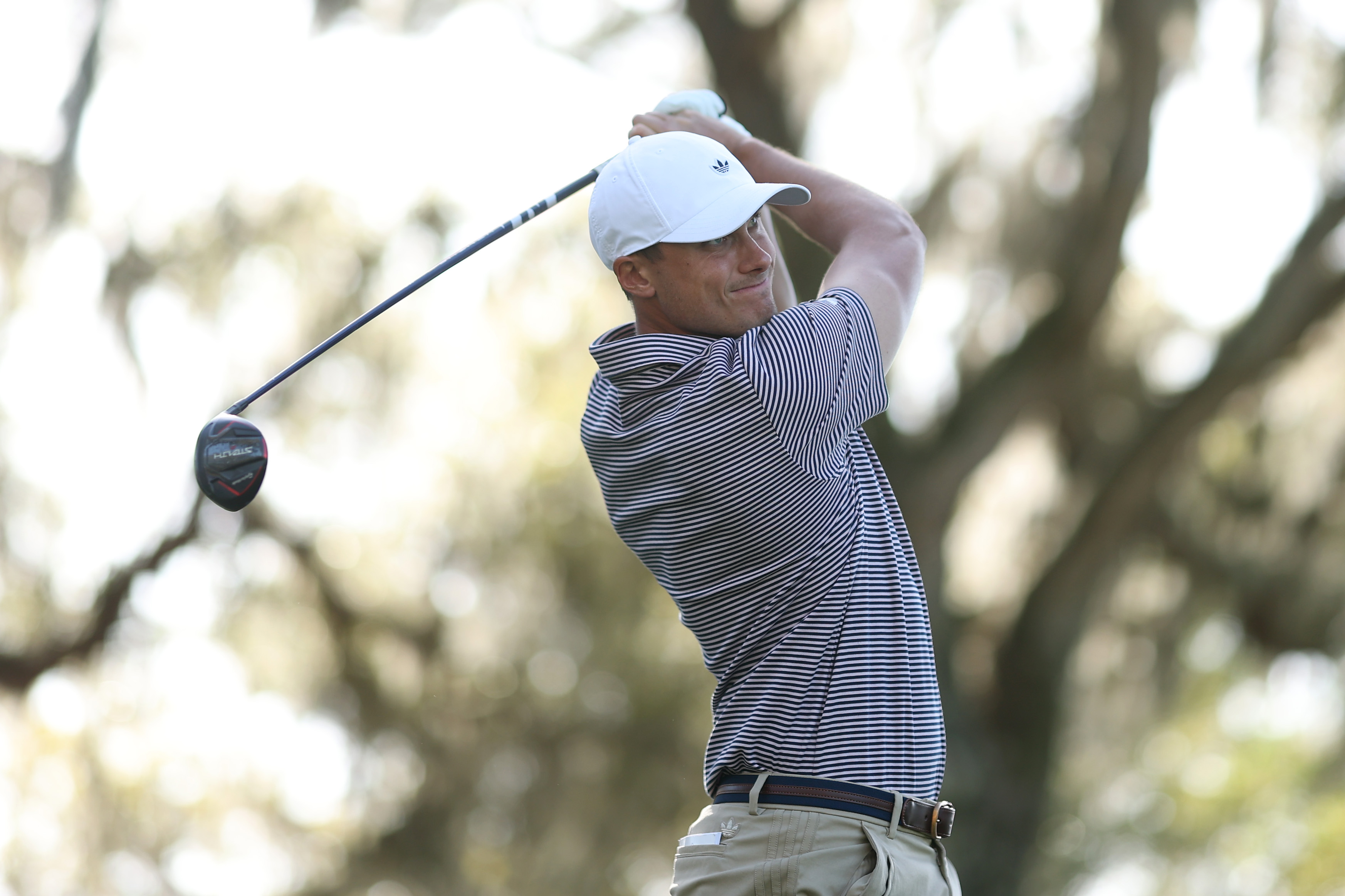 Ludvig Aberg hits a fairway wood