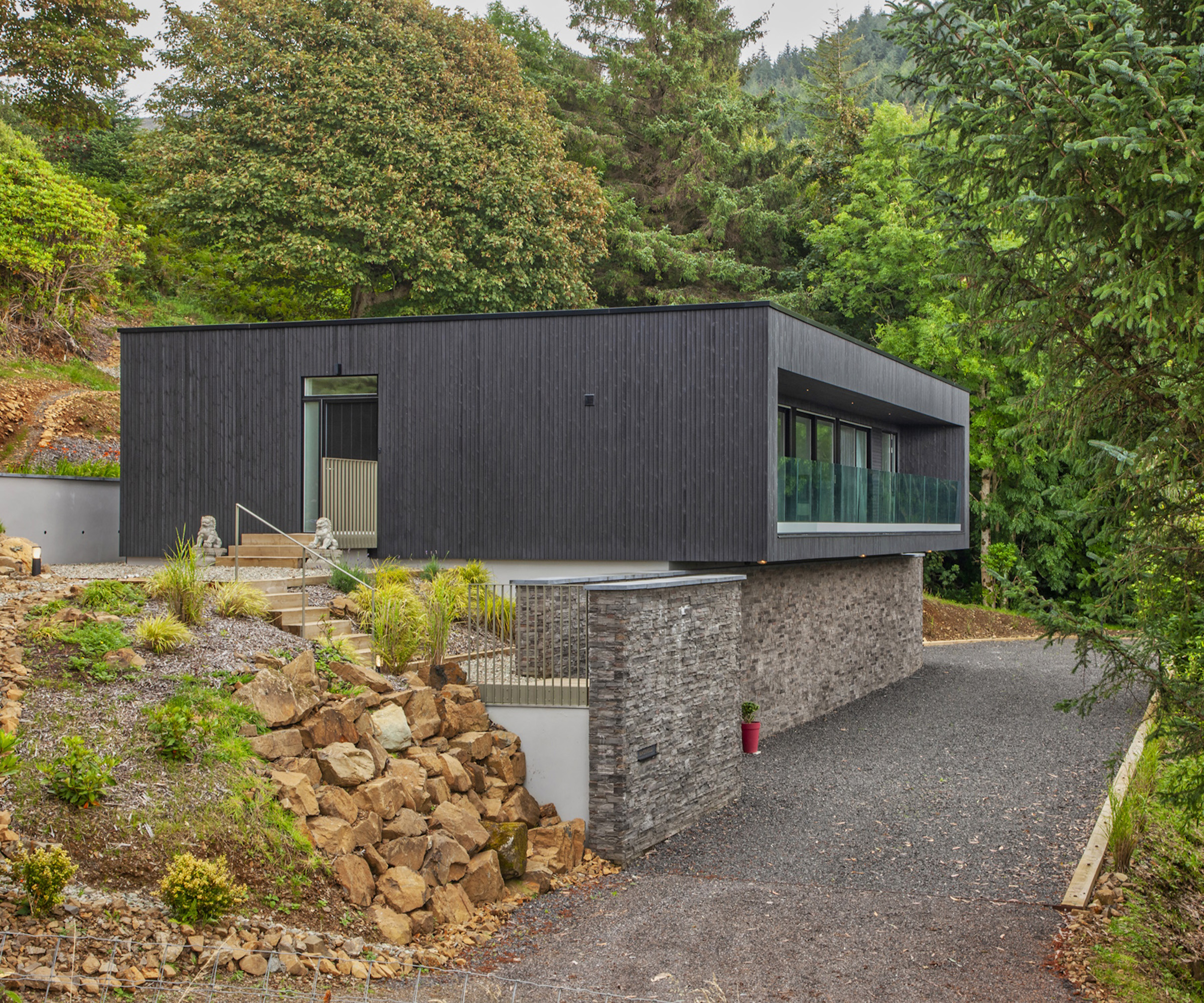 A self build black box style home in the hills