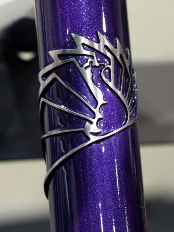 Peacock Groove's stainless steel head tube badges are among the easiest to recognize.
