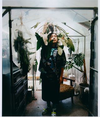 Portrait of Chinese artist Cao Fei in her Beijing studio