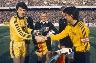 Soviet Union goalkeeper shakes hands with Rene Muller ahead of a fixture against East Germany.in the 1980s.
