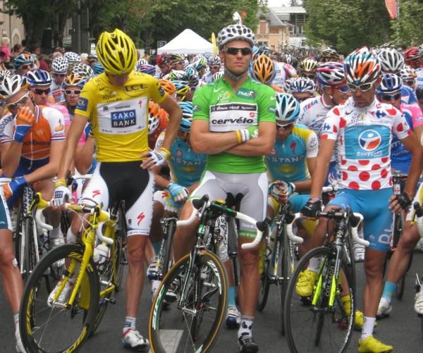 the yellow, green and polka-dot jersey wearers line-up for the start