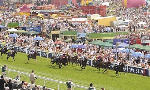 A race at the Investec Derby Meeting