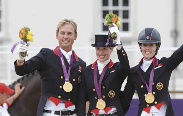 Record breakers: Britain took to the podium to collect their first Olympic dressage medal