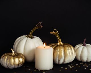 white and gold painted pumpkins