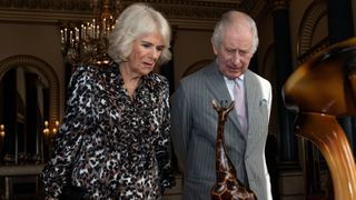 King Charles III and Queen Camilla view part of the Royal Collection relating to the Royal family's long standing connection to Kenya