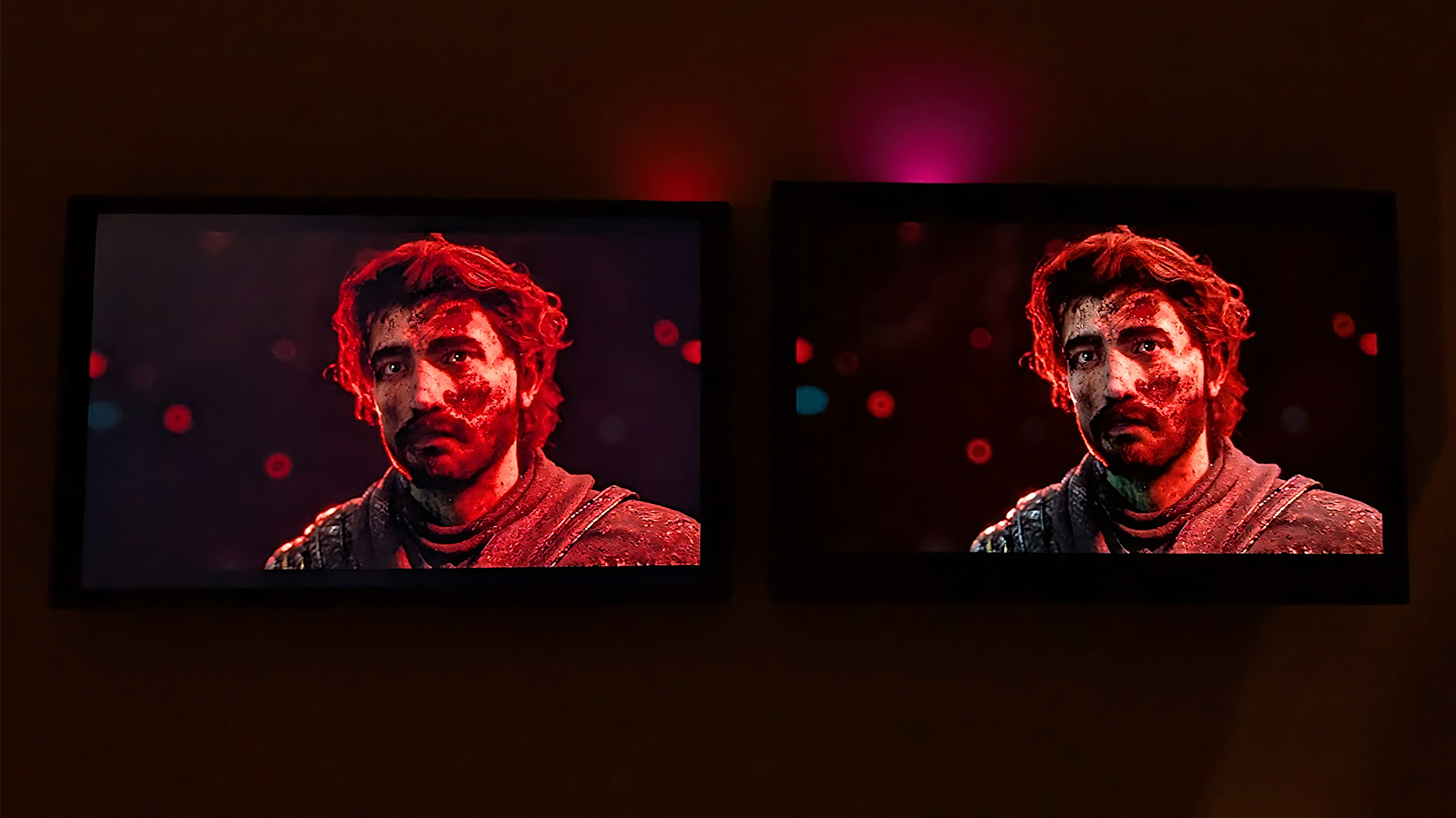 An image of the Lenovo Legion Go 2 and original Legion Go screens displaying the same image from Clair Obscur: Expedition 33. The OLED screen offers better color accuracy and true black contrast.