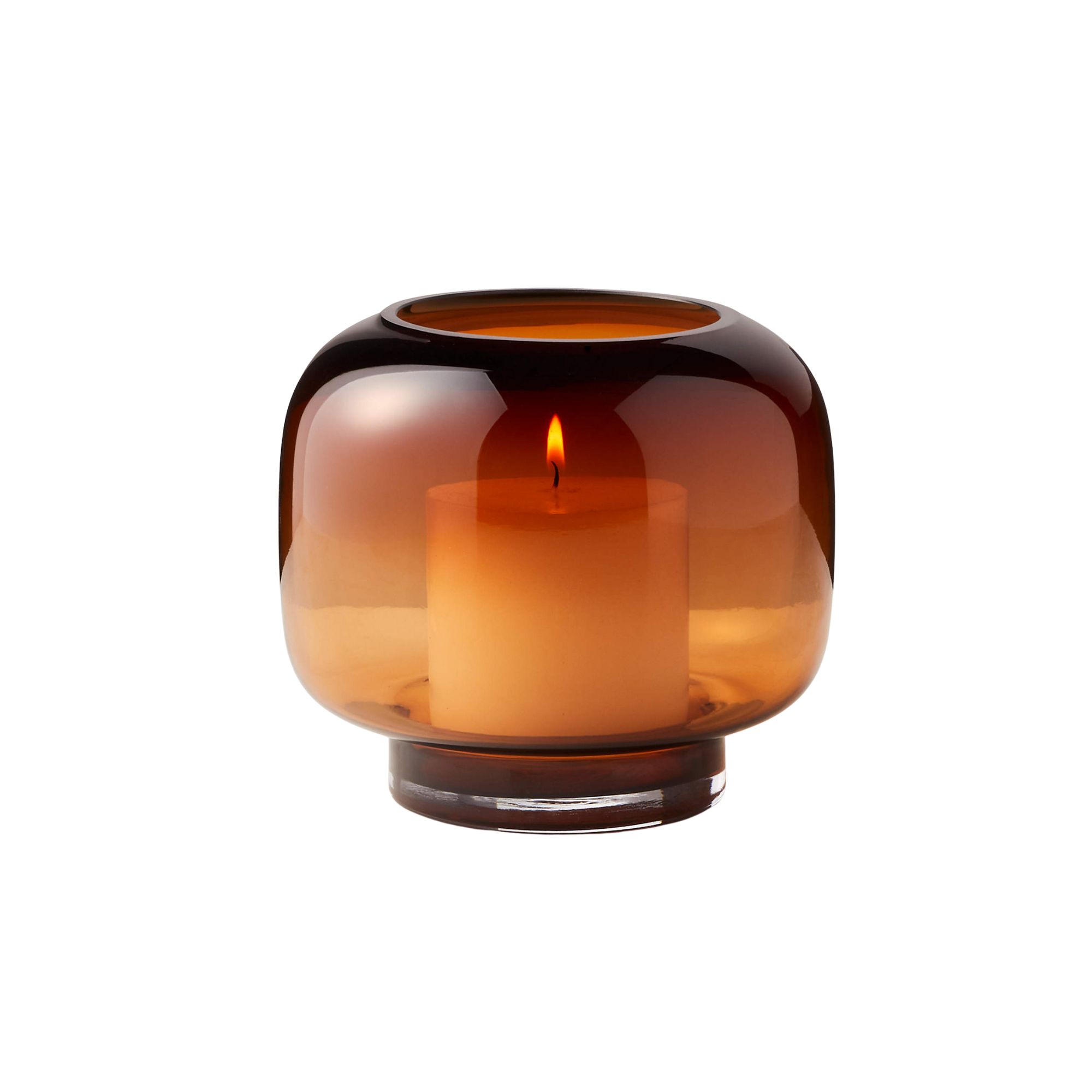 round glass candle holder with candle inside