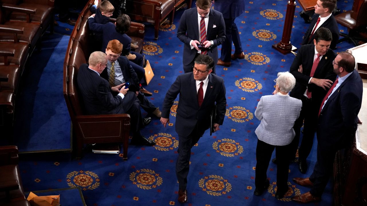 Rep. Mike Johnson (R-La.) leaves the floor after the House failed to elect a Speaker of the House on in the first vote on the first day of the 119th Congress 