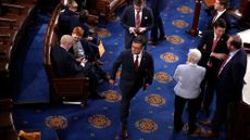 Rep. Mike Johnson (R-La.) leaves the floor after the House failed to elect a Speaker of the House on in the first vote on the first day of the 119th Congress 