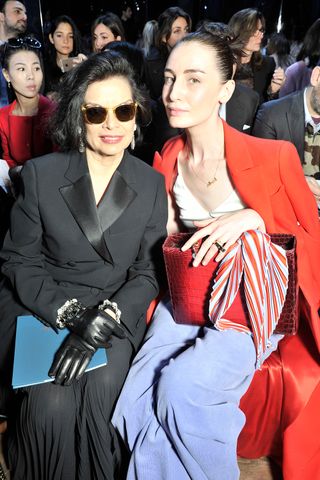 Erin O'Connor And Bianca Jagger Sitting Front Row