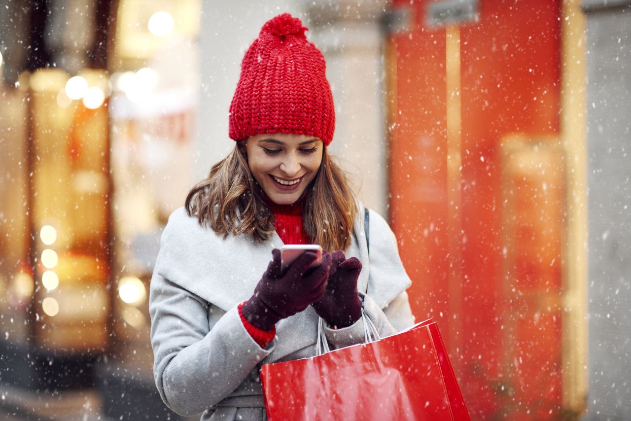 A woman looking at her phone.