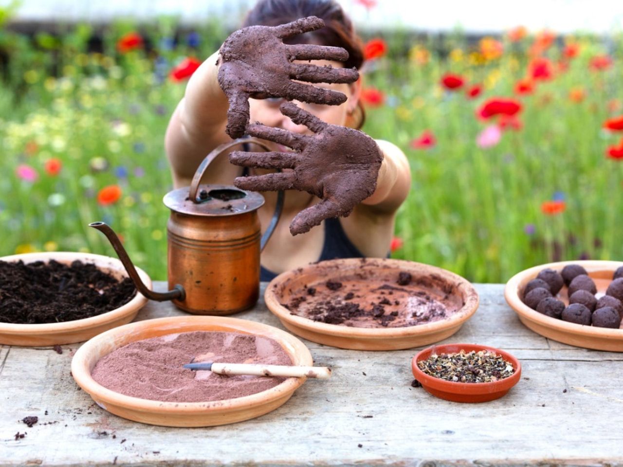 Person Making Seed Balls