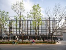 spark AI data centre building in Beijing in daylight with trees in front of it