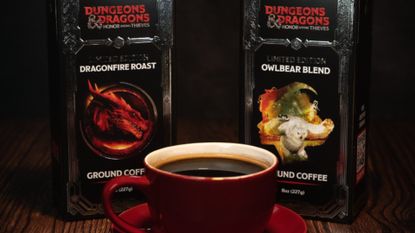 A cup with two packs from the Dungeons & Dragons Coffee Club