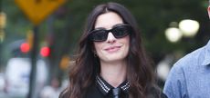 Anne Hathaway wearing dark sunglasses