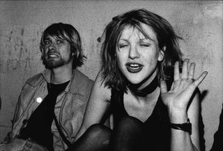 Kurt Cobain gurns while Courtney Love looks sleepy
