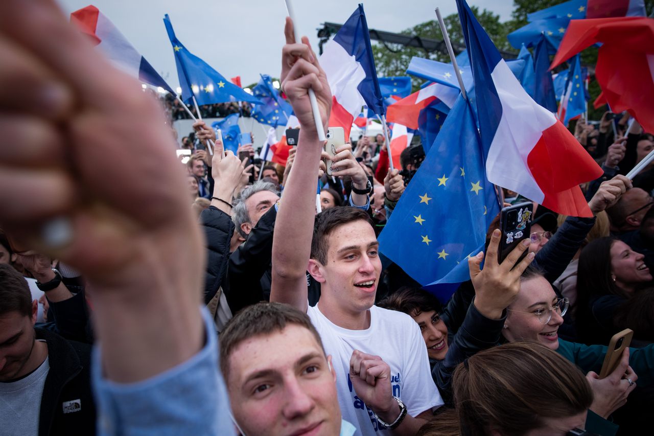 Supporters of French President Emmanuel Macron celebrate his re-election