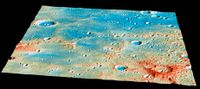 The region of Mercury where NASA's MESSENGER spacecraft crashed on April 30, 2015. This image was taken by MESSENGER during the course of its work at Mercury and so does not show the resulting crater. Higher-elevation regions are colored red in this image, while lower areas are blue.