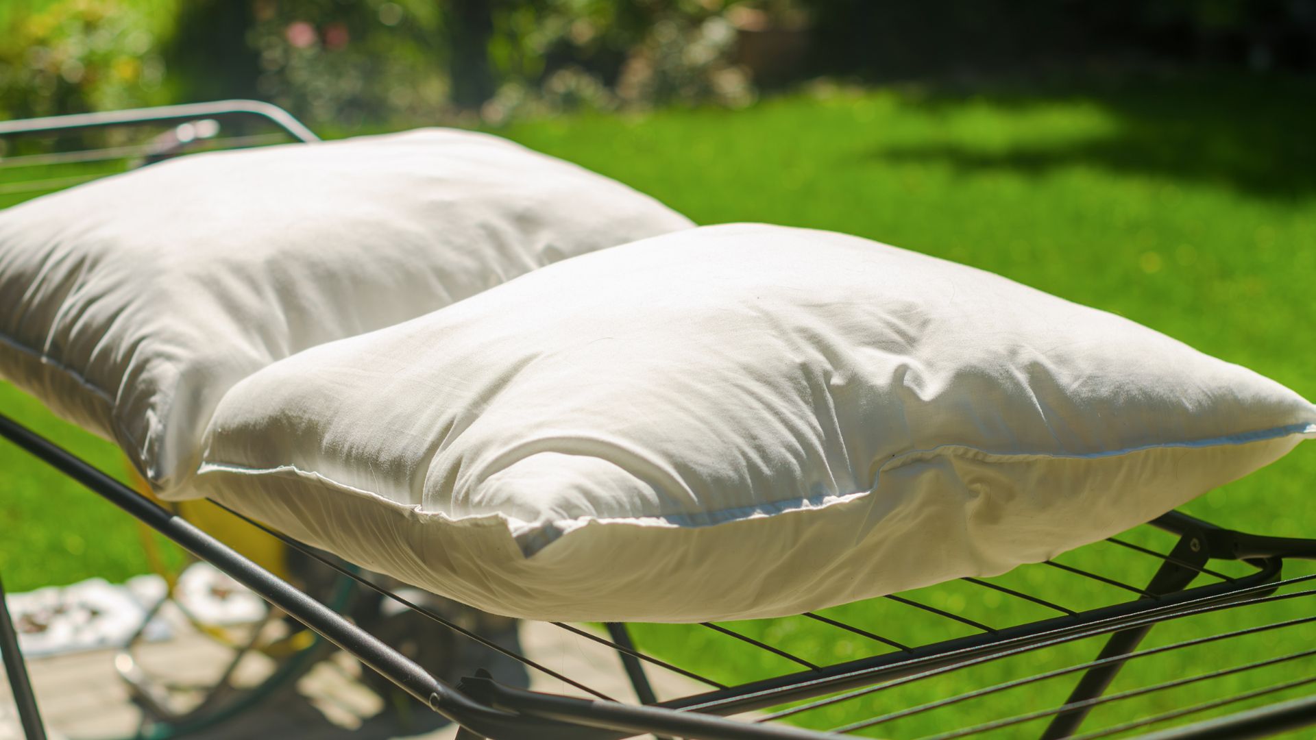 picture of two pillows drying on an airer