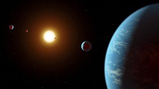 An artist's illustration of the K2-138 system, which contains at least five planets orbiting closely around their parent star.