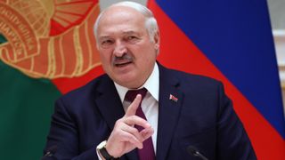 Alyaksandr Lukashenka waving a finger in the air.