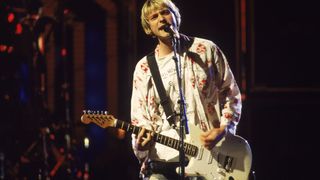 Rock singer Kurt Cobain (1967 - 1994) performs on stage with Nirvana at the MTV Video Music Awards, September 10, 1992..