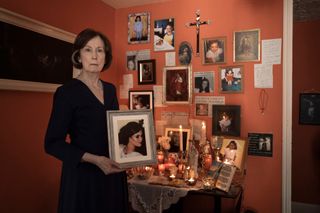 Ingrid Craigie as grieving Marjorie holding a photo of her daughter Chloe, played by Grace Collender.