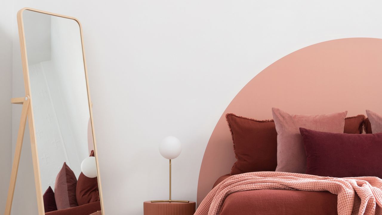 a semi circle painted headboard