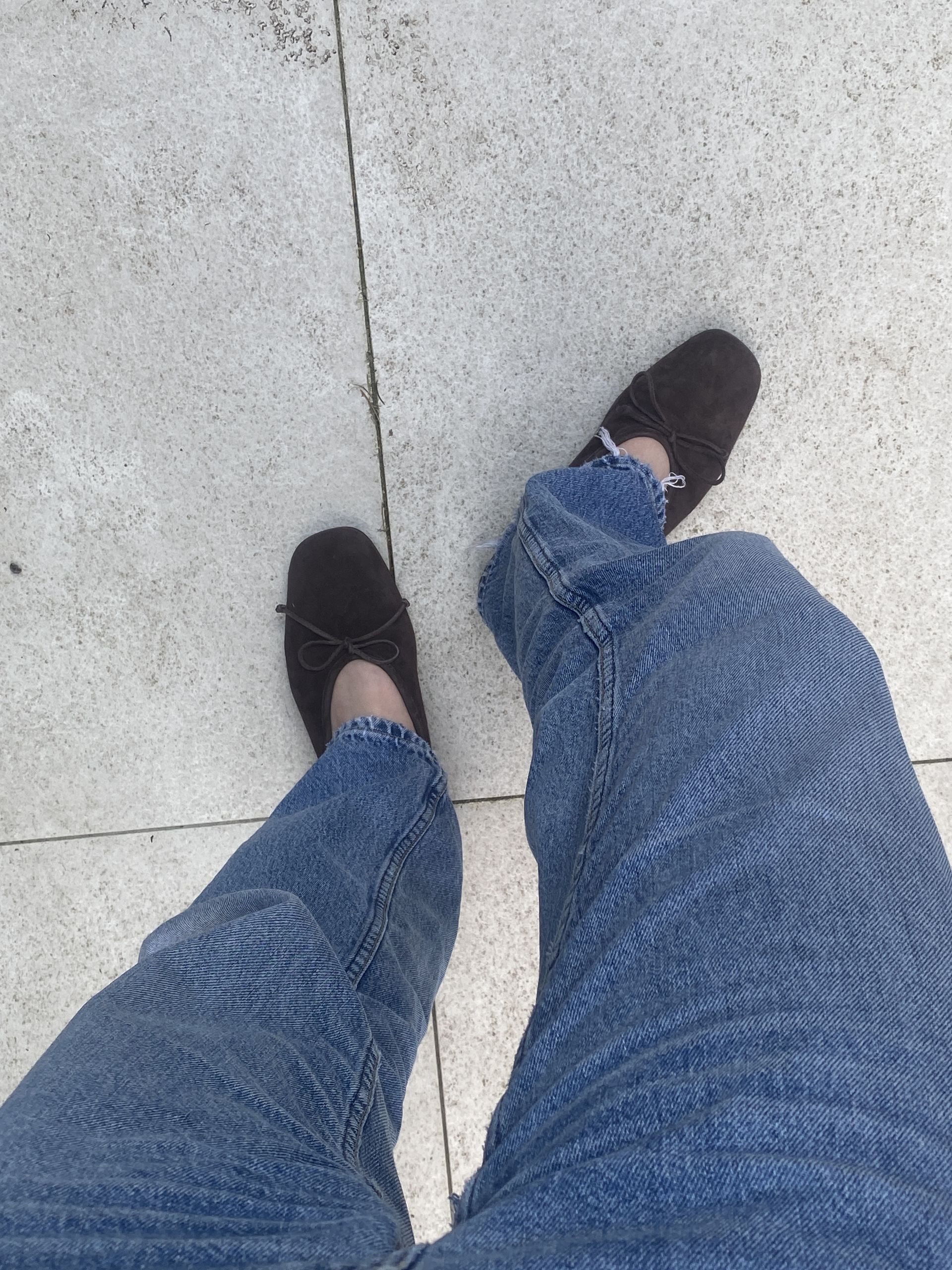 Natalie wearing the Arket suede ballet flats.